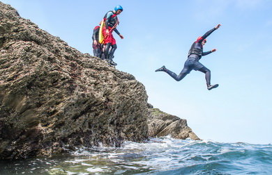 Coasteering off rocks Croyde north devon